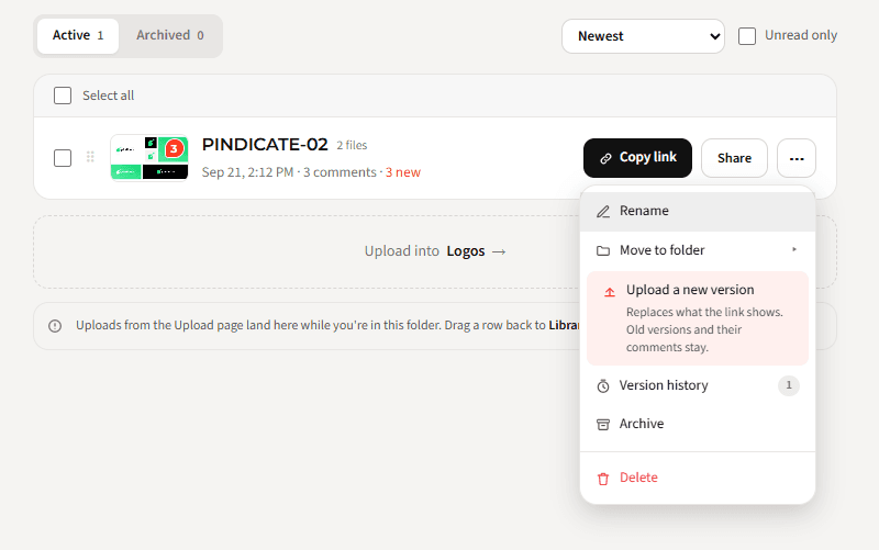 A review's menu with Upload a new version and Version history
